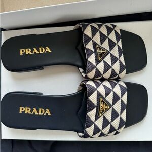 Prada Embroidered fabric slides